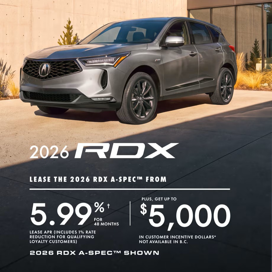 2026 Acura RDX October Offer, Photo of Gray Acura SUV parked in front of home.